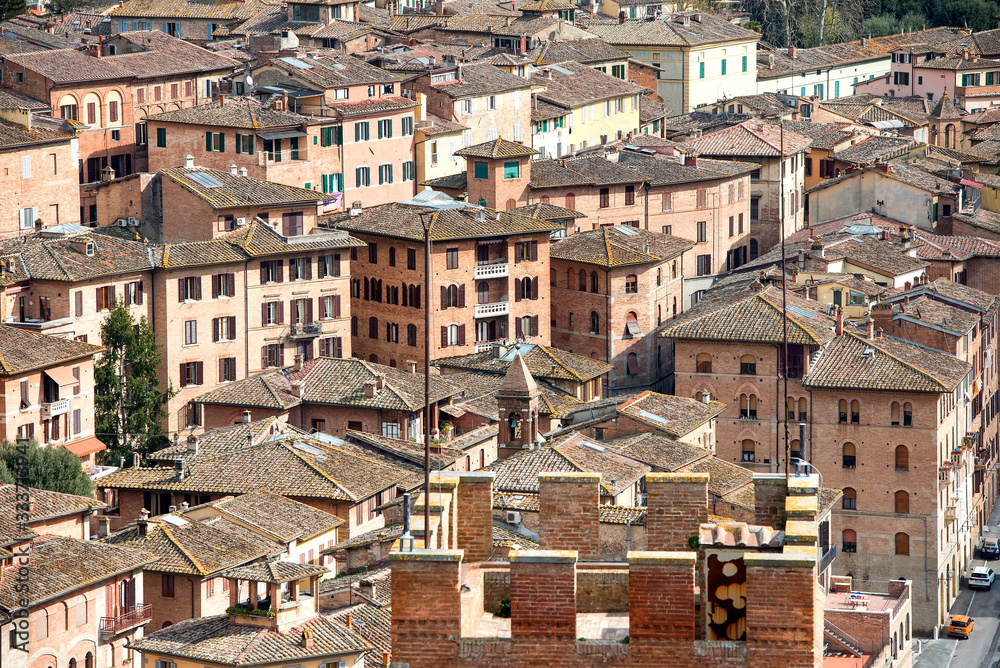 aerial view over roofs of the Siena, medieval town, capital of the province of Siena in Tuscany, Italy