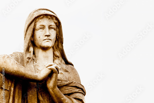 Fotografie, Obraz Fragment of ancient stone statue of Mary Magdalene praying