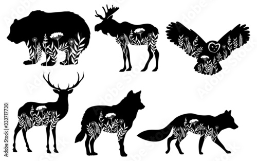 Set of stylized nature animals. Collection of animal silhouettes with a flowers. Logos of wild animals. Tattoo. Vector illustration for children.