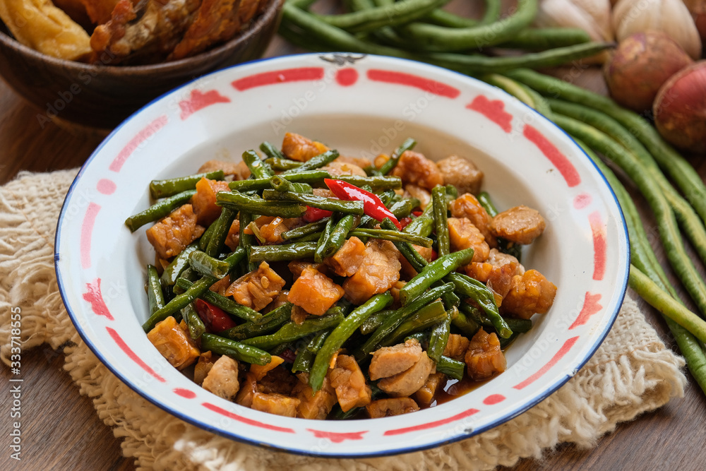 traditional indonesian food. asian culinary oseng tempe mixed with long beans traditional indonesian food. asian culinary oseng tempe mixed with long beans