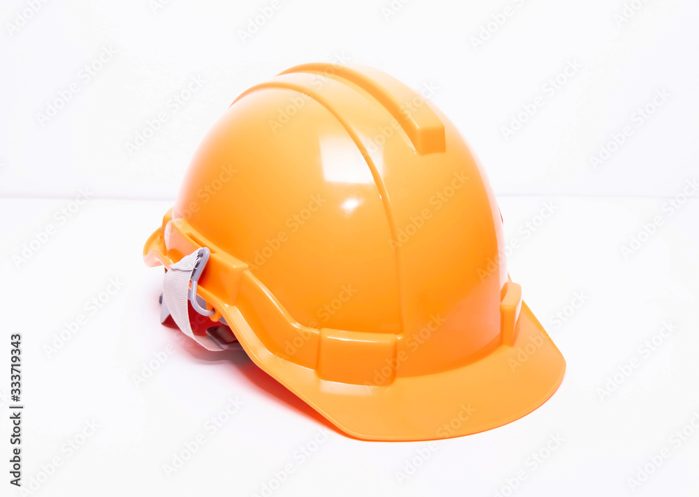 Orange helmet, side angle in a white background Orange helmet, side angle in a white background