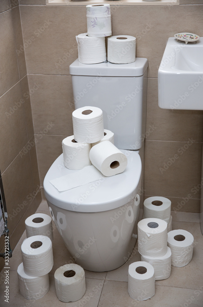 Fototapeta premium Panic Buying of Toilet Roll during Coronavirus Outbreak with a toilet full of toilet paper