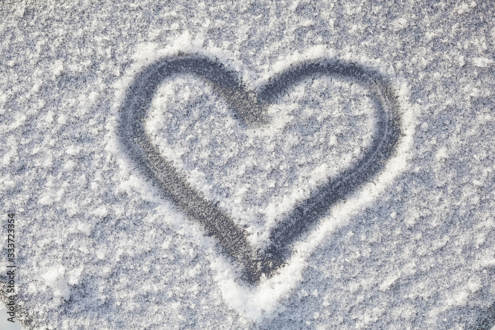 A picture of heart on the snow