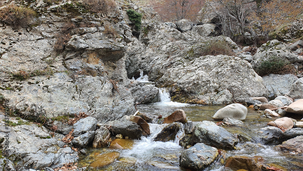 water flowing over rocks water flowing over rocks