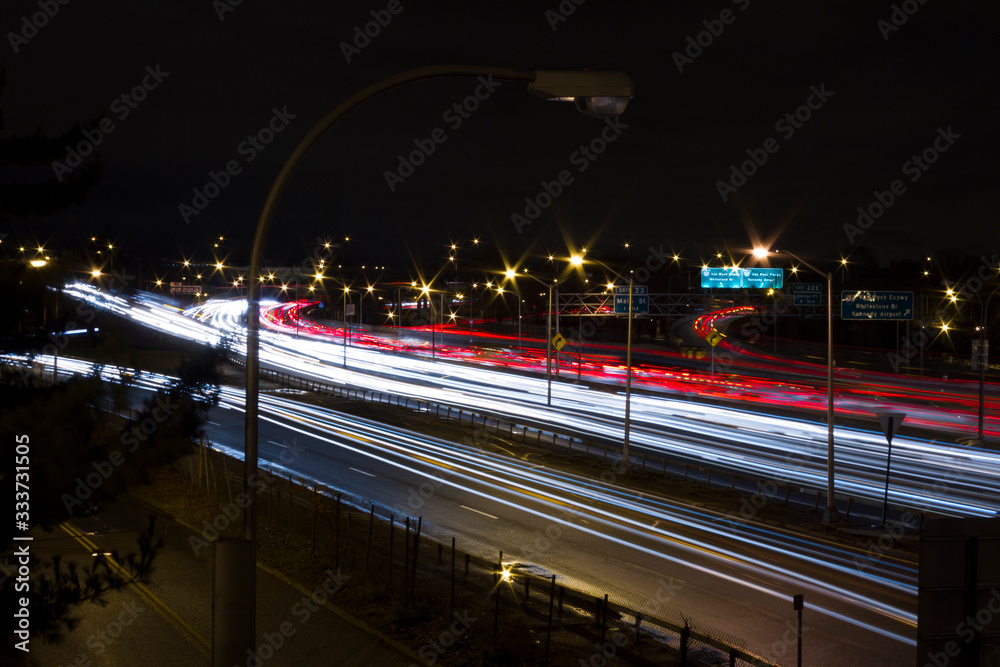 Fototapeta premium Car Lights on Road, Long Exposure of American Road. Light trails