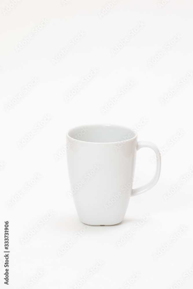 white cup for tea or coffee on a white background