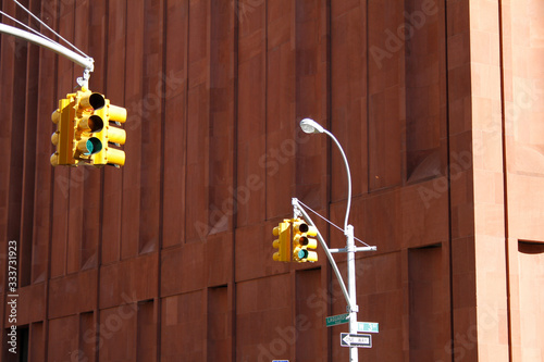 Yellow Traffic Lights in Manhattan showing Green Lights on Laguardia and West third Street photo