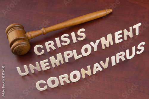 Unemployment because corovavirus and quarantine concept. Judge gavel and words coronavirus, crisis and unemployment.