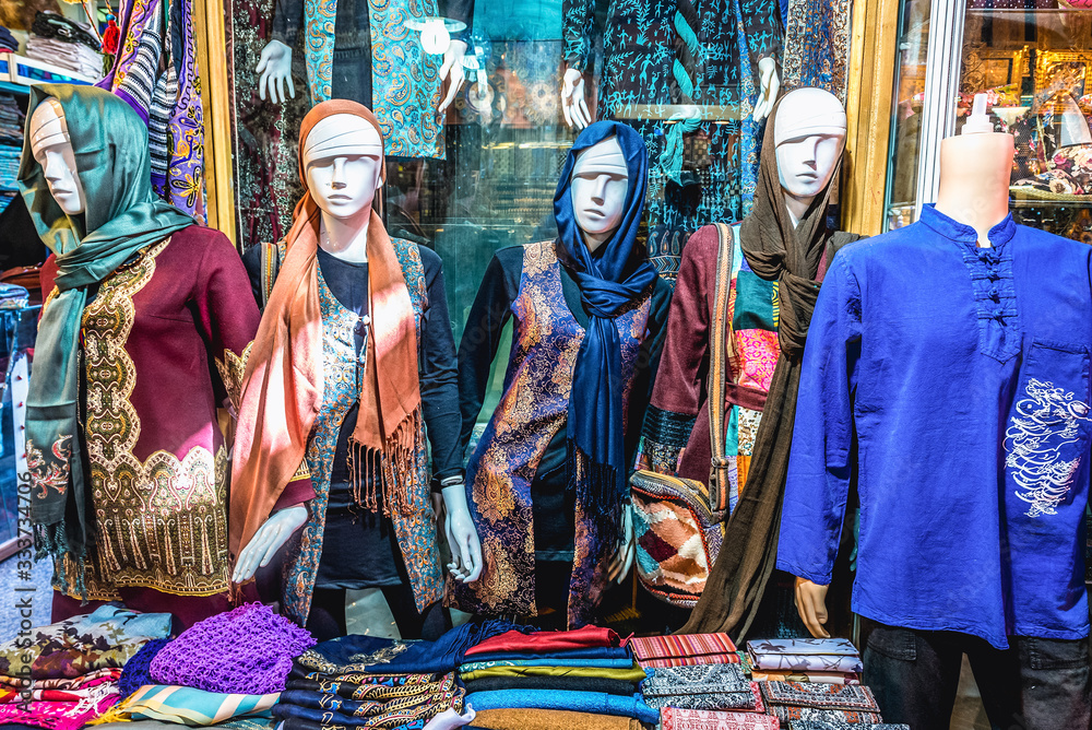 Clothes for sale on the Grand Bazaar also called Qeysarriyeh or Soltani bazaar in Isfahan city, Iran Clothes for sale on the Grand Bazaar also called Qeysarriyeh or Soltani bazaar in Isfahan city, Iran