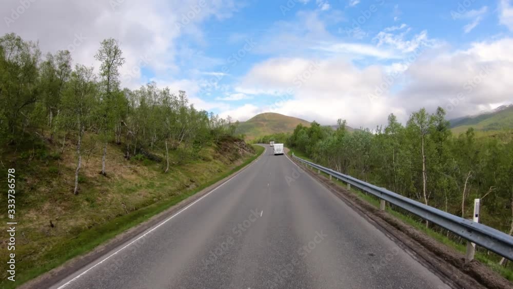 Vehicle point-of-view Driving a Car VR Caravan travels on the highway. Tourism vacation and traveling. Beautiful Nature Norway natural landscape. Vehicle point-of-view Driving a Car VR Caravan travels on the highway. Tourism vacation and traveling. Beautiful Nature Norway natural landscape.