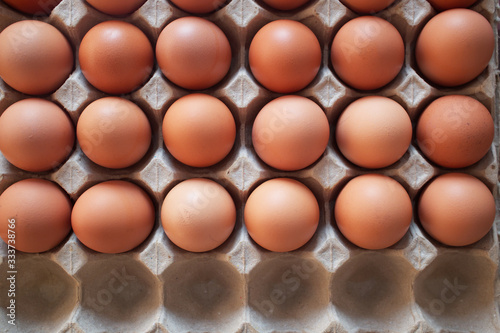 top view Eggs on the panel on the vintage brown wooden floor