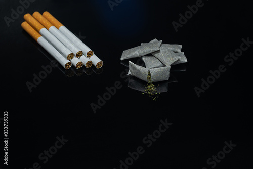 Nicotine products of various types. Cigarettes - smoking tobacco and snus - chewing tobacco photo