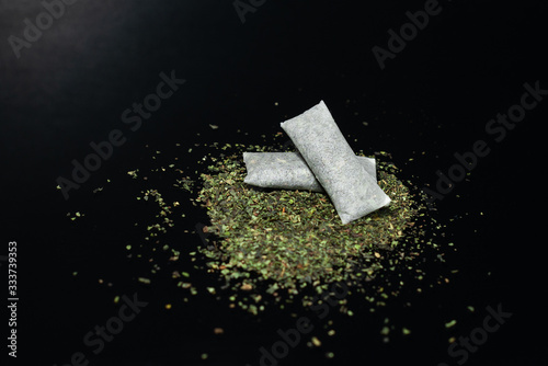 Snus - grated moistened chewing tobacco. Close-up of a weighted option