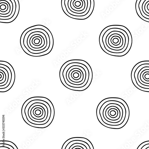 Vector seamless pattern of black hand-drawn circles isolated on a white background