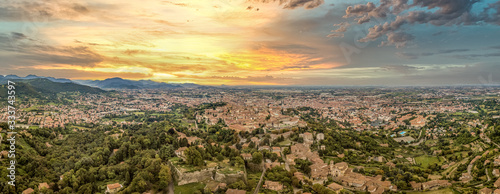 Aerial sunset panorama of Bergamo in Lombardia Italy, with dramatic colorful sky