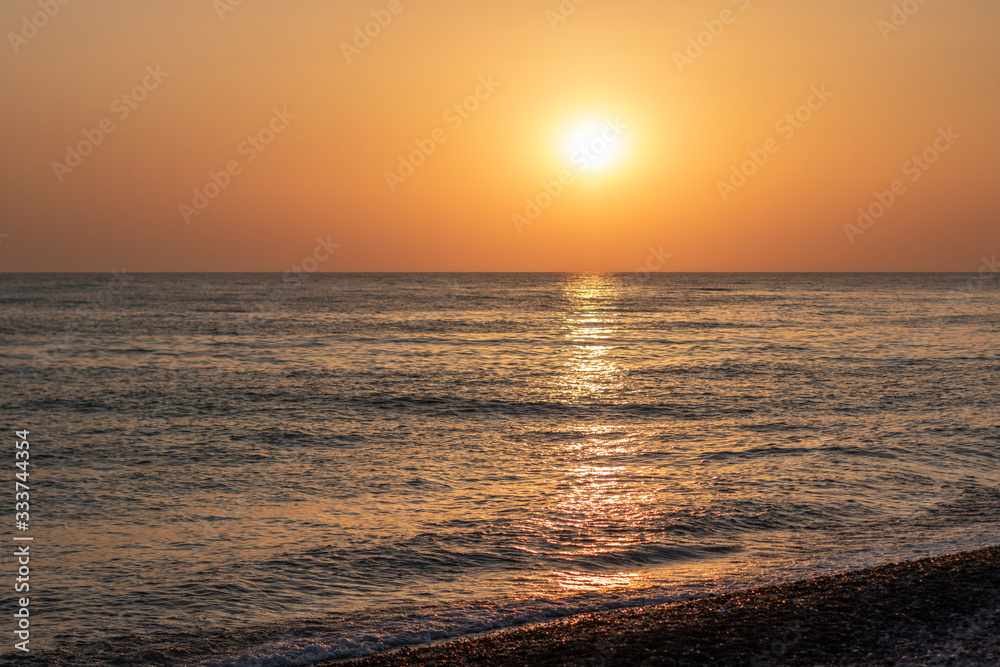 Marine background: beautiful sunset on the sea