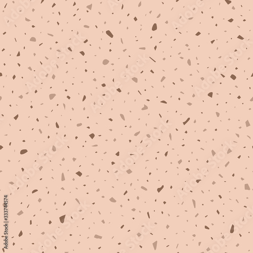 Seamless pattern, small elements of abstract form randomly scattered. Brown-chocolate shades of color. Vector.