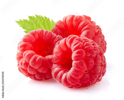 Raspberry with leaf isolated on white background