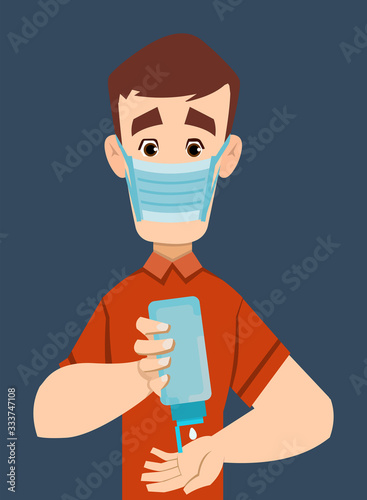 handsome man wear mask and sanitizing hands with sanitizer gel
