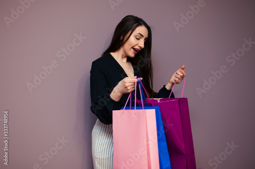 young surprised girl look at shopping