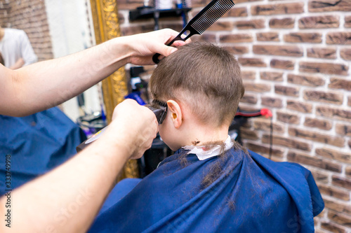  boy in a barbershop