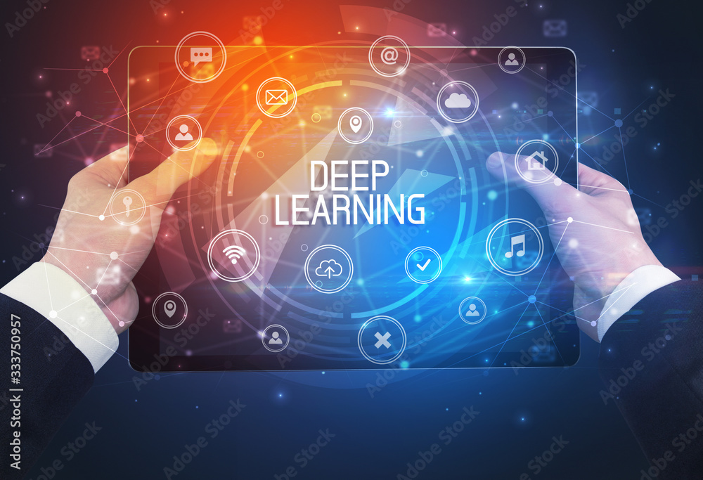 Obraz premium Close-up of a tablet with DEEP LEARNING inscription, innovative technology concept
