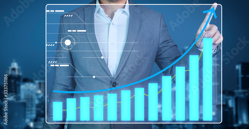 Businessman asian use technolgy show graph holographic statistics stock exchange global market investment for report investor in meeting room 