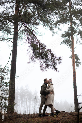 Winter picnic in forest. Love story in winter foggy forest. valentines concept. cloudy foggy day in forest © Mykyta