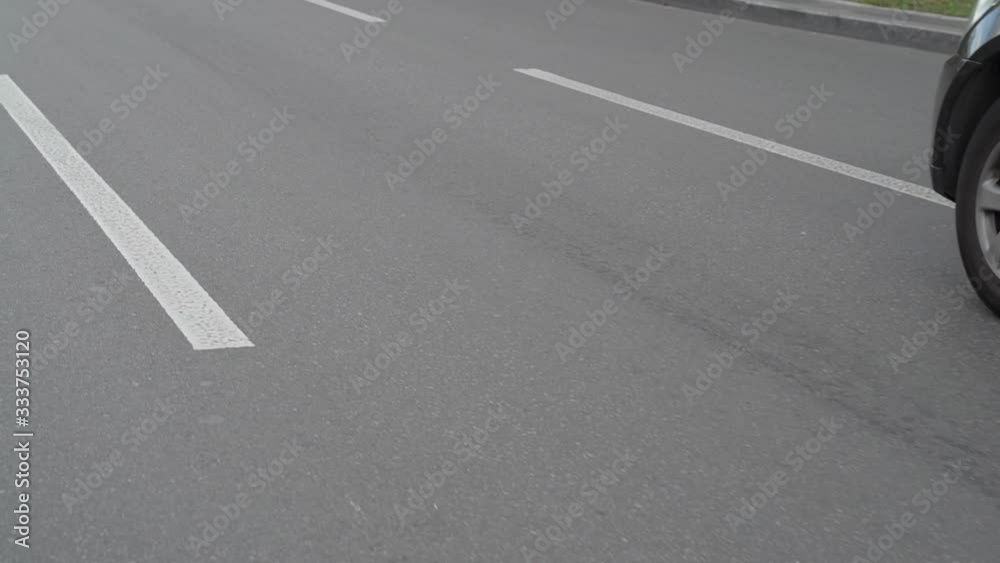Road marking lines city street dotted line camera movement slow motion Road marking lines city street dotted line camera movement slow motion