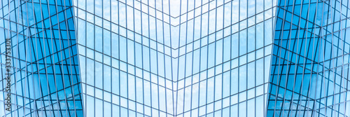 underside panoramic and perspective view to steel blue glass high rise building skyscrapers  business concept of successful industrial architecture