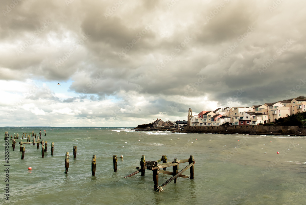 Swanage old pier in a cloudy day, England
