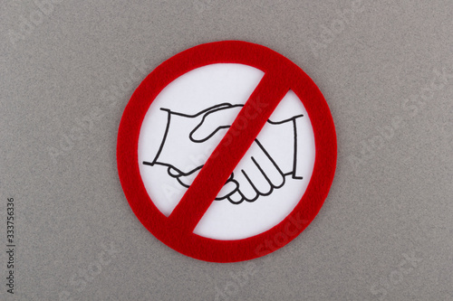 No shaking hands or handshake prohibition sign. Hygiene and social distancing during a pandemic COVID-19.