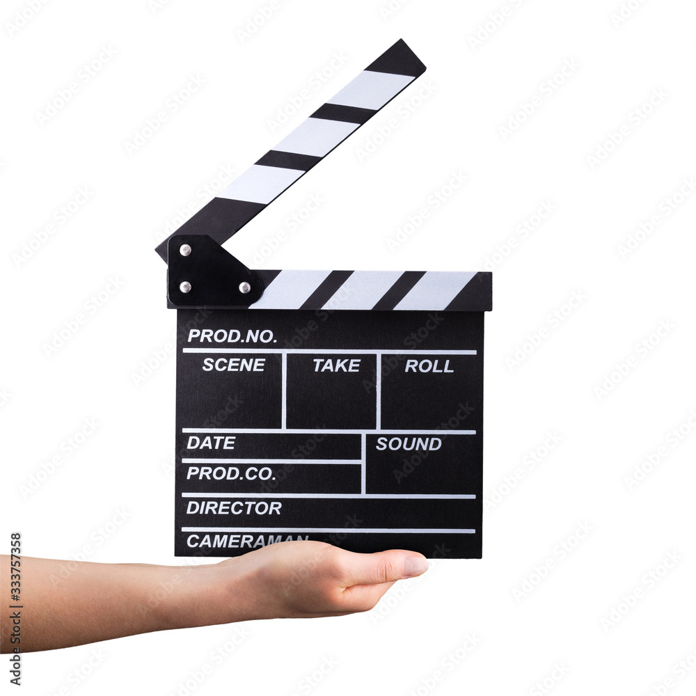 Human hand holding film clapper board isolated on white background with clipping path