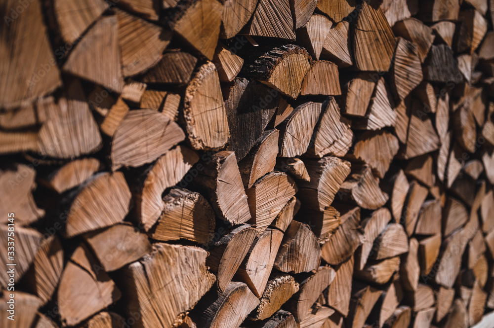 Wooden natural sawn logs as background, top view, flat lay. Wood texture.