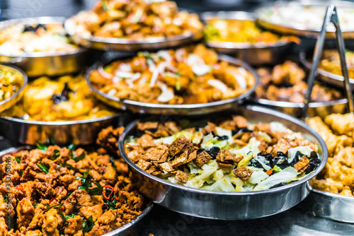 Traditional Asian dishes sold in a food court in Singapore