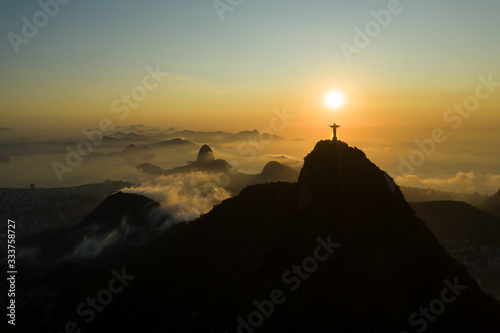 Aerial, panoramic view of Guanabara Bay and Corcovado with Christ the Redeemer statue during the sunrise in Rio de Janeiro