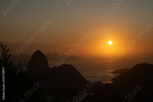 Amazing orange sunrise over the Sugarloaf Mountain in Rio de Janeiro Brazil