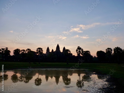 Angkor Wat during sunrise, shadows before lake with reflections, ruins of Angkor, Cambodia © HWL Photos