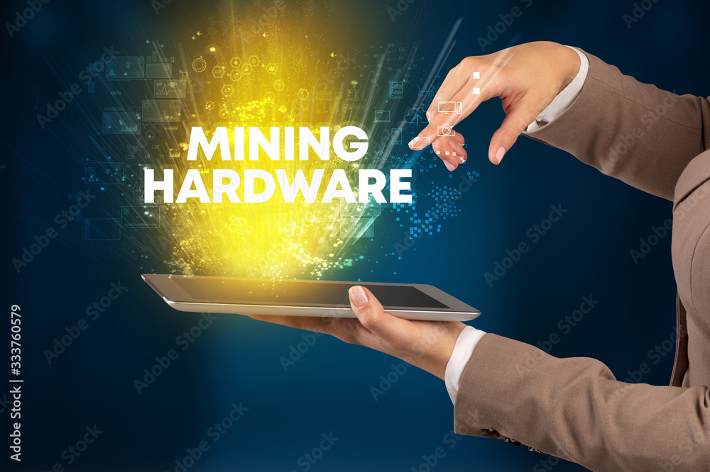 Close-up of a touchscreen with MINING HARDWARE inscription, innovative technology concept Close-up of a touchscreen with MINING HARDWARE inscription, innovative technology concept