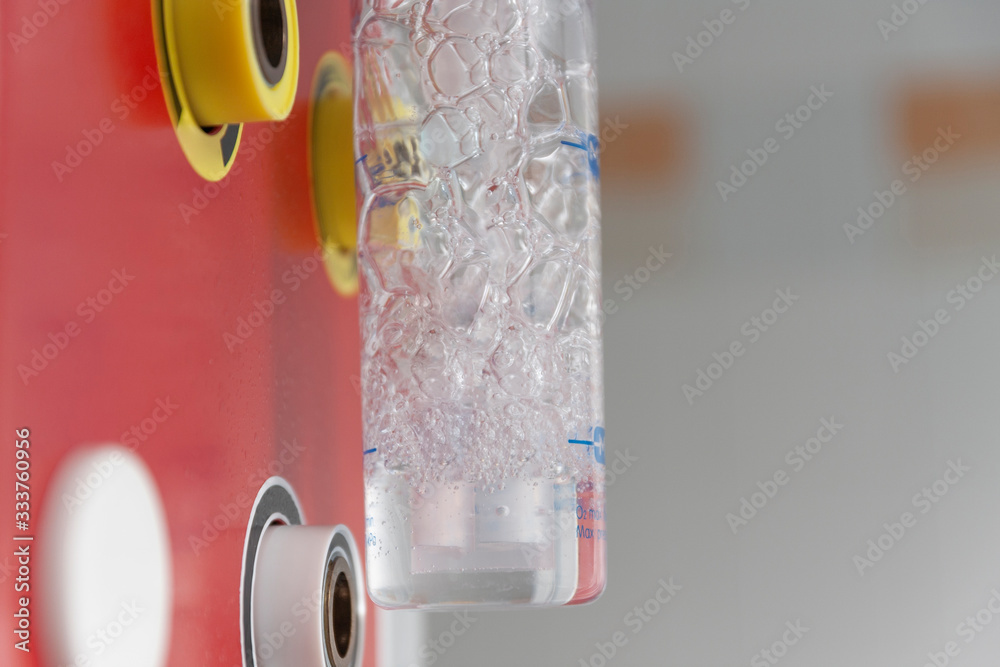 Medical oxygen flow meter with humidification bottle. Oxygen therapy is