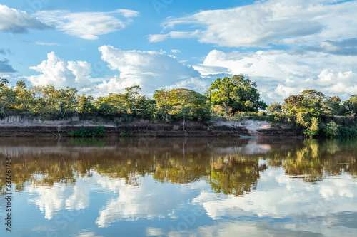 Fototapeta Naklejka Na Ścianę i Meble -  The tranquility of navigating the Javaés River, located in Lagoa da Confusão, in the state of Tocantins. Ecological tourism on a beautiful sunny autumn day, enjoying the natural beauty of Brazil.