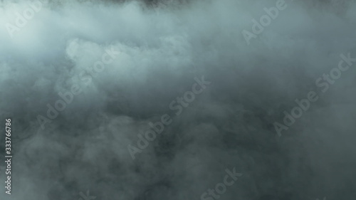 Photo of Real Smoke on a black background - realistic overlay for different projects.