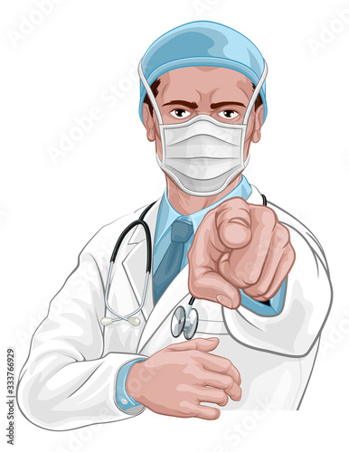 A doctor pointing at the viewer in a wants or needs you gesture in PPE protective mask. Medical concept