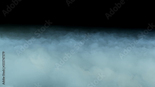 Photo of Realistic Clouds on black dark Background.