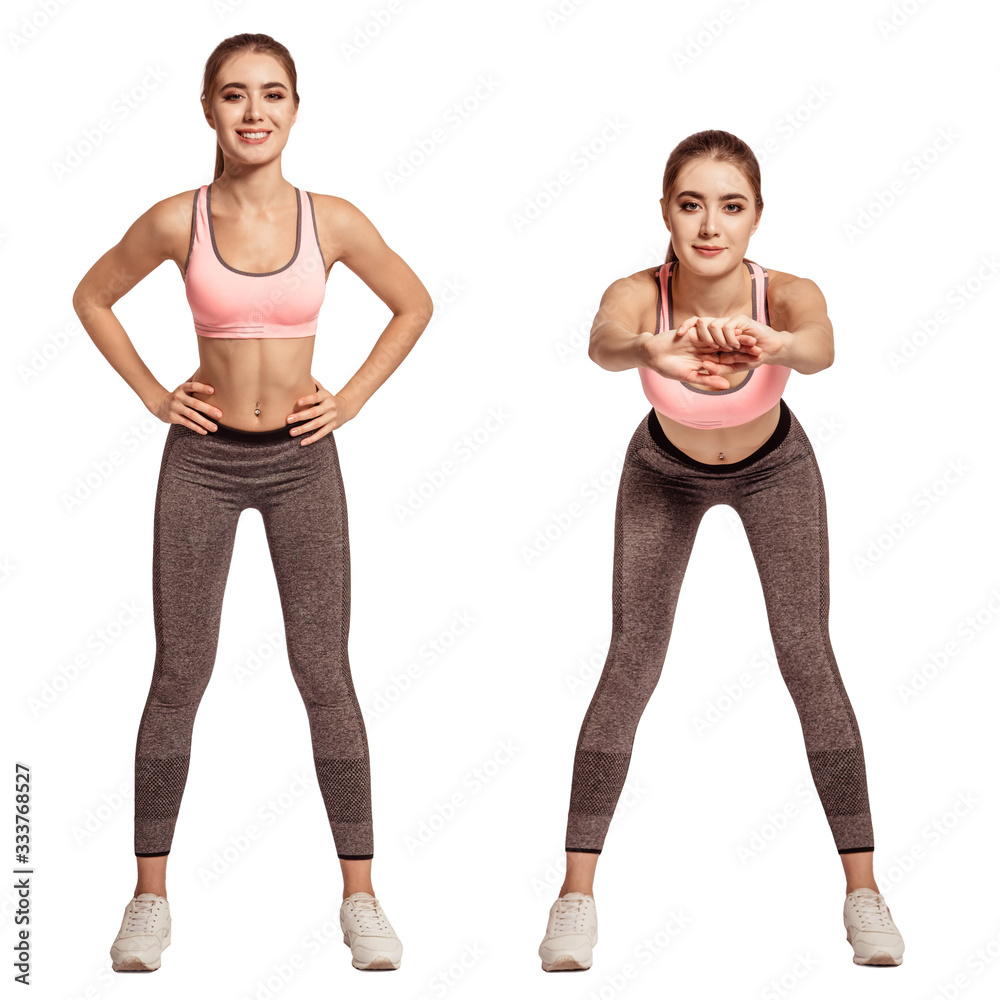 Beautiful, woman stands in sportswear. Strong, athletic body, thin, flat stomach. Makes a stretching exercise, pull the hands forward, do exercises. White background, isolate. Beautiful, woman stands in sportswear. Strong, athletic body, thin, flat stomach. Makes a stretching exercise, pull the hands forward, do exercises. White background, isolate.