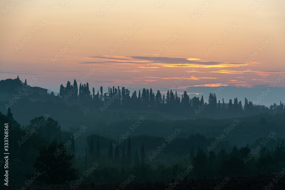 Naklejka Sonnenaufgang über der Toskana, Italien