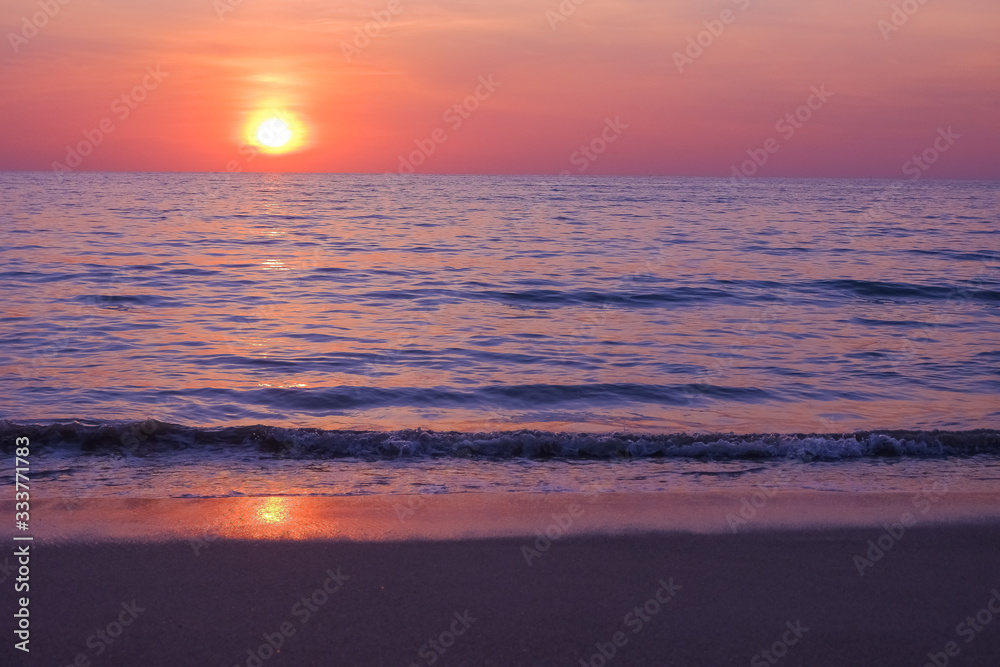 sea sunset landscape image with reflection.Tropical sunset on the sandy beach.ban,restriction, limitation on flights. Stop coronavirus, stay home concept.Health protection and travel.Selective focus