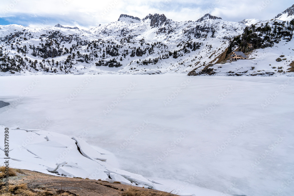 Colomers lake and refuge in National Park of Aigüestortes and lake of Sant Maurici. Colomers lake and refuge in National Park of Aigüestortes and lake of Sant Maurici.