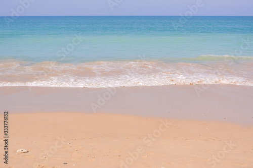 Amazing Tropical beach, sand and sun in blue sky. Summer nature scene.Beautiful seascape with white sand on the beach and blue water on the sea. Travel concept.Nature background.Summer holiday concept
