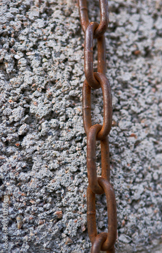 steel rusty chain on a beautiful background © Igor
